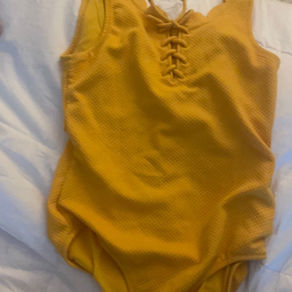 Swimsuit. M woman . Yellow
